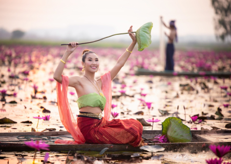 young-asian-women-in-traditional-dress-in-the-boat-2023-11-27-05-18-42-utc (1)